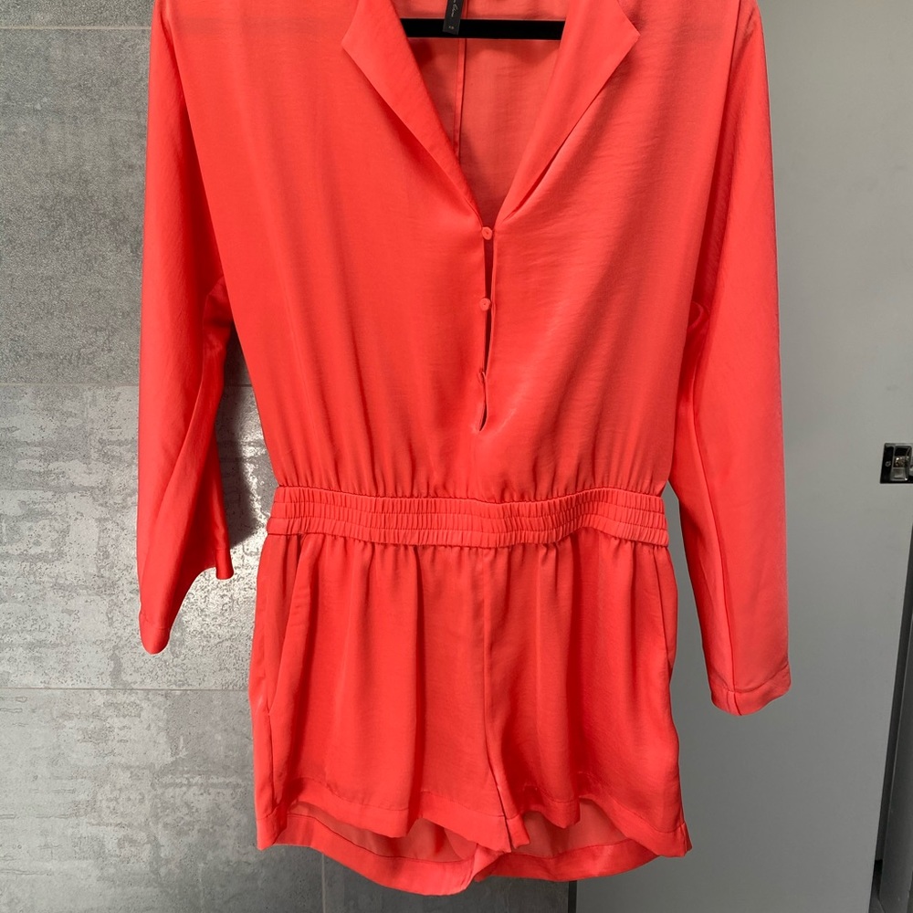 BCBG MAXAZRIA ORANGE LONG SLEEVE ROMPER